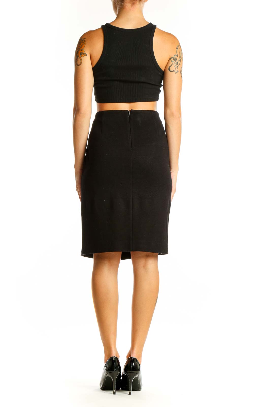 Side view of BOSS by HUGO BOSS black crop top and pencil skirt set