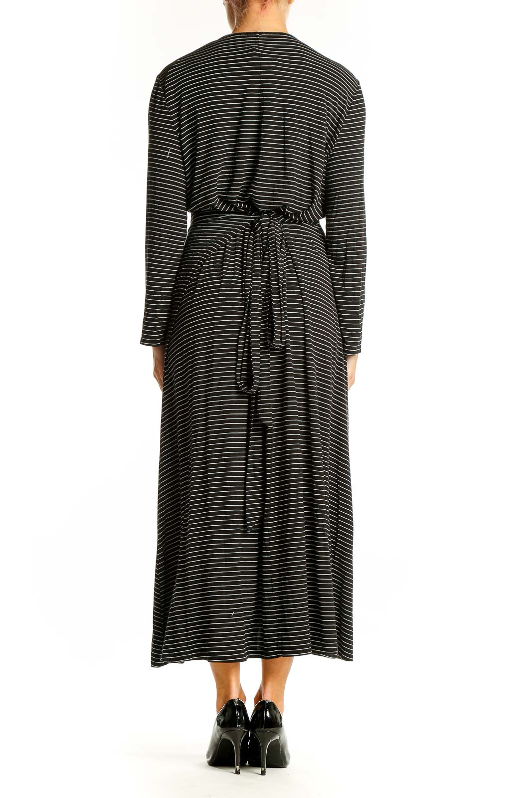Side view of Gap black striped wrap midi dress showing silhouette