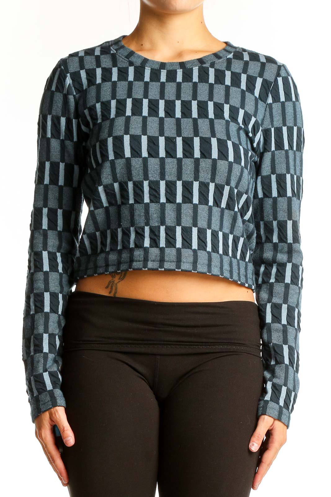 Front view of Madewell blue checkered crop knit sweater with geometric pattern
