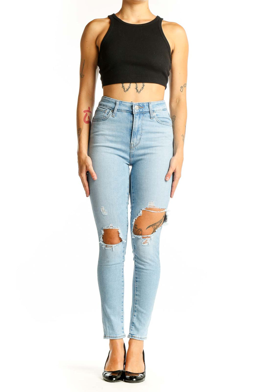 Front view of Levi's light blue distressed high-waist skinny jeans