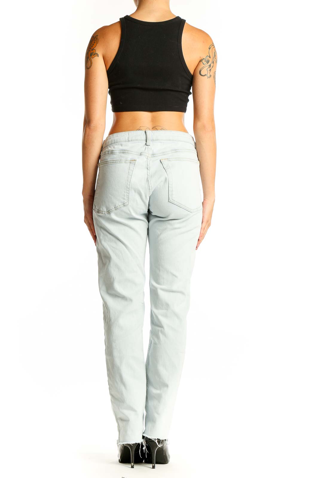 Back view of Rag & Bone light blue straight leg jeans on model