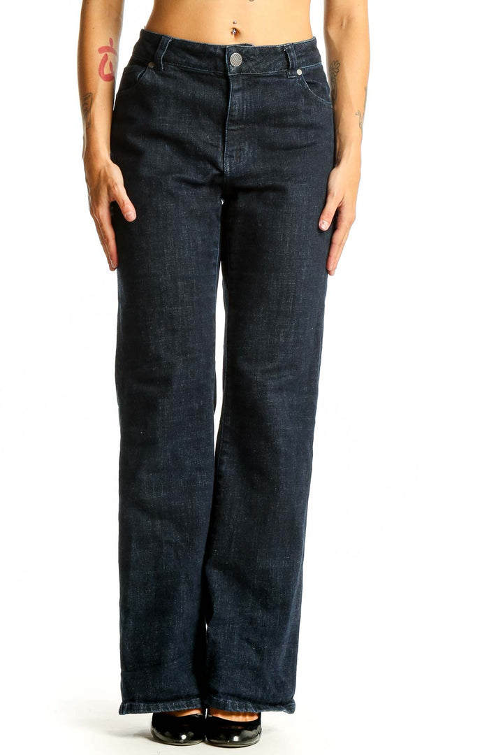 Front view of Cabi dark blue wide-leg jeans on model