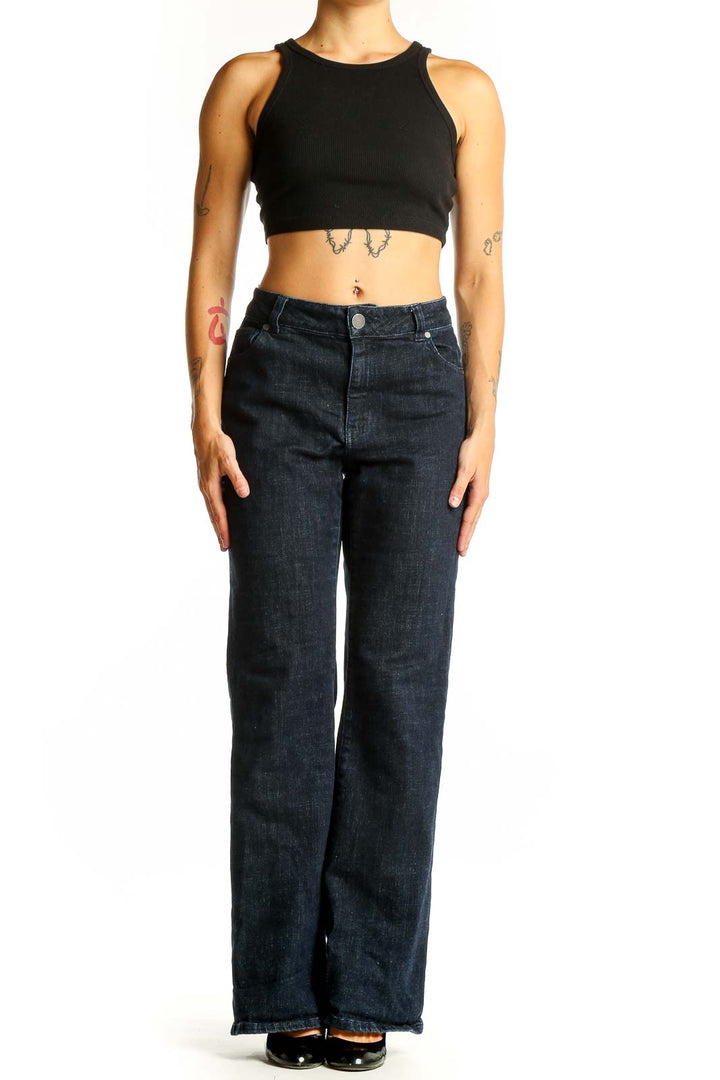 Front view of Cabi dark blue wide-leg jeans on model
