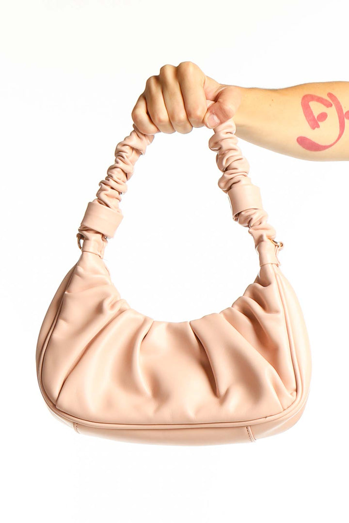 Front view of Urban Expressions blush ruched shoulder bag