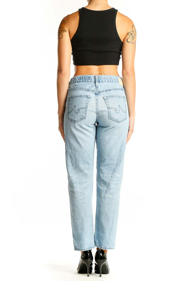 Side view of Adriano Goldschmied light blue straight leg jeans on model