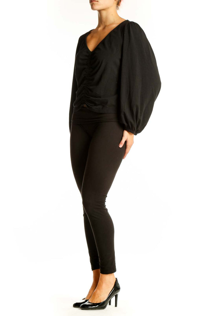 Front view of black Banana Republic ruched V-neck top with long sleeves
