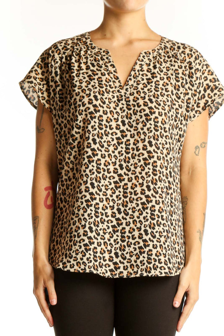 Front view of Banana Republic beige leopard print short sleeve blouse with V-neck