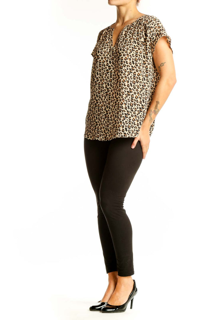 Front view of Banana Republic beige leopard print short sleeve blouse with V-neck