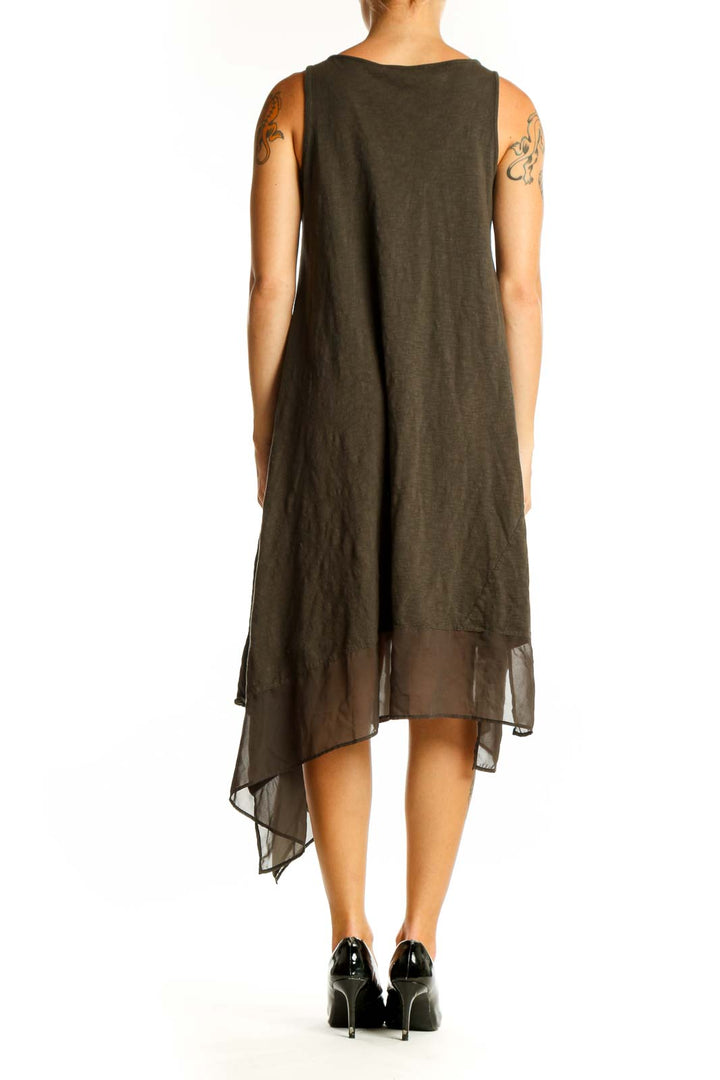 Back view of olive Philosophy sleeveless dress showing asymmetrical hem and sheer overlay