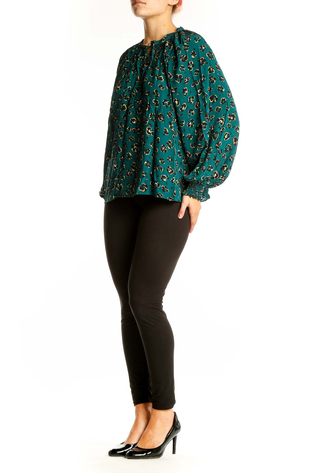 Front view of teal leopard print blouse with long sleeves and keyhole neckline