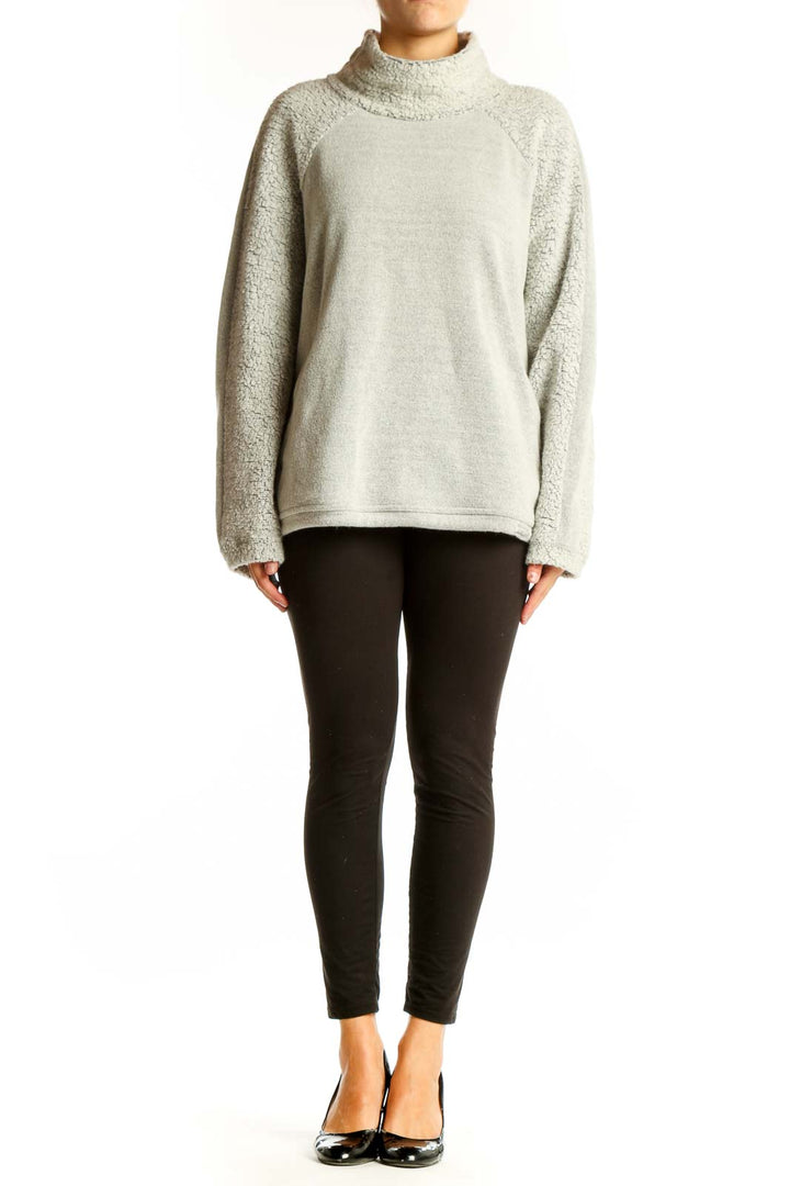 Front view of light gray prAna turtleneck sweater with oversized fit