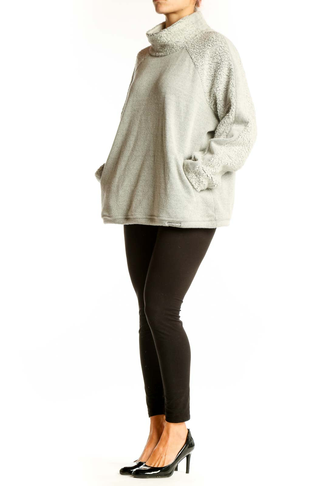 Front view of light gray prAna turtleneck sweater with oversized fit