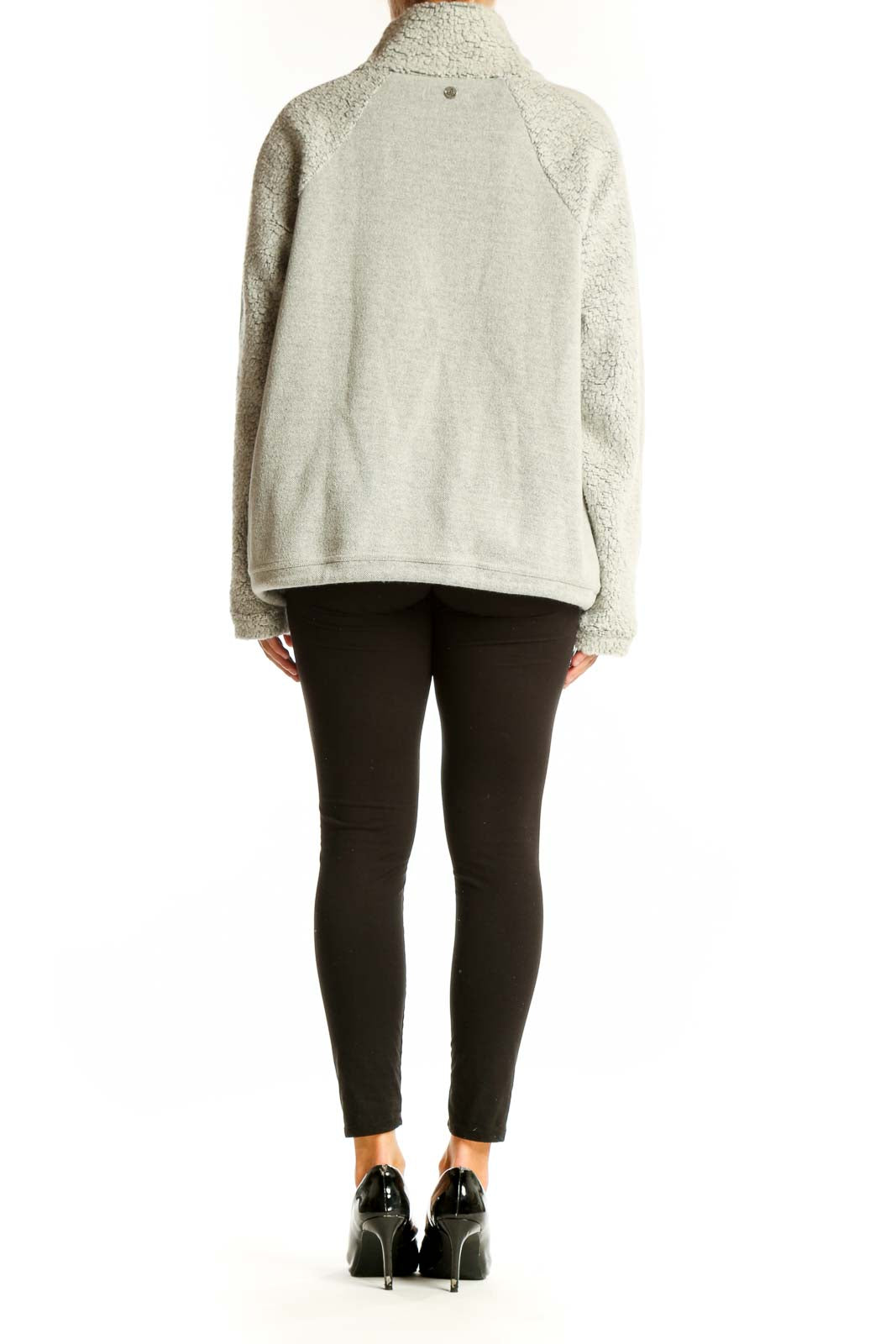 Side view of light gray prAna turtleneck sweater showing relaxed silhouette