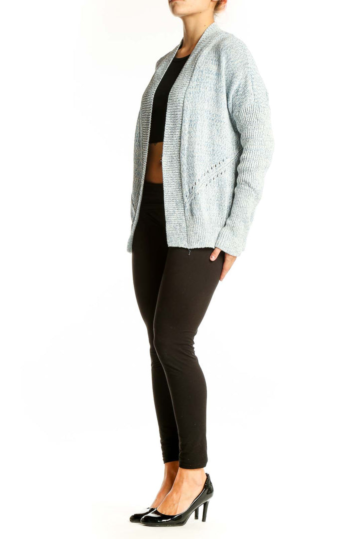 Front view of light blue Gap open front knit cardigan on model