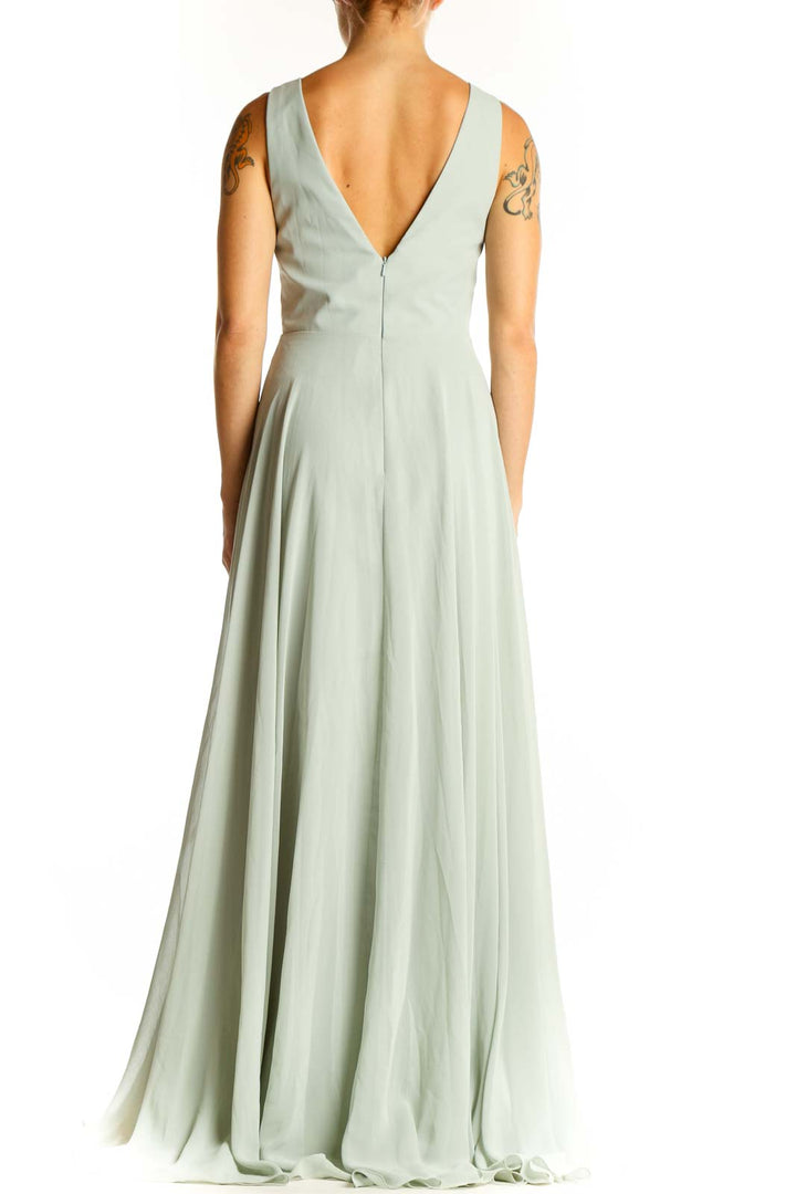 Back view of sage green Jenny Yoo maxi dress showing open back design