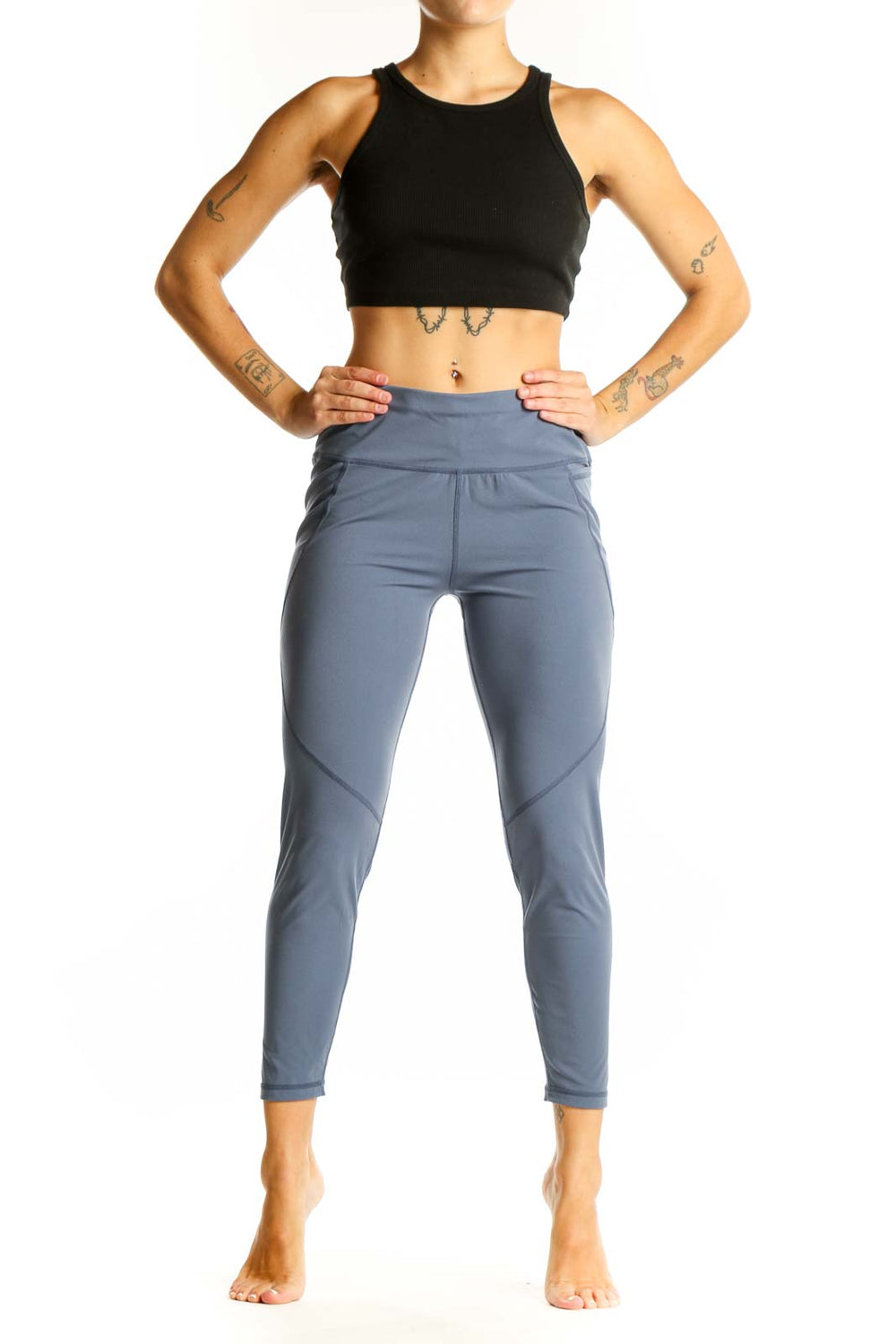 Front view of Sweaty Betty blue high-waisted performance leggings