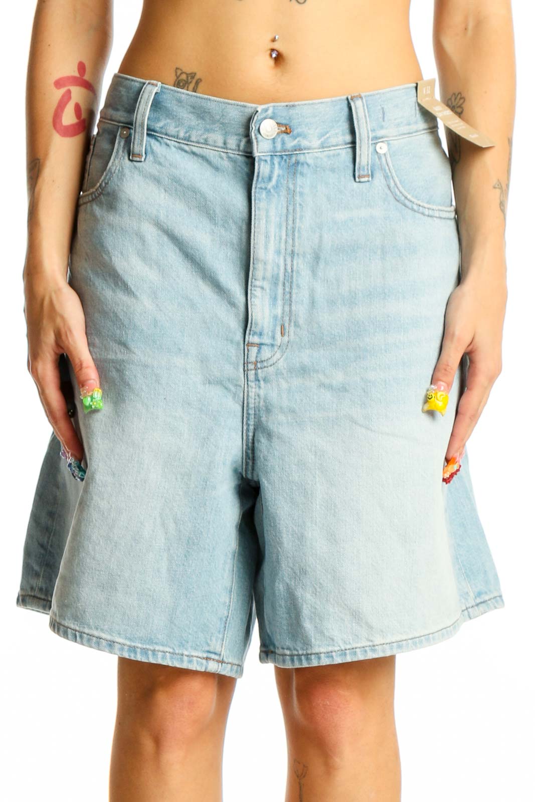 Front view of light blue Madewell denim Bermuda shorts
