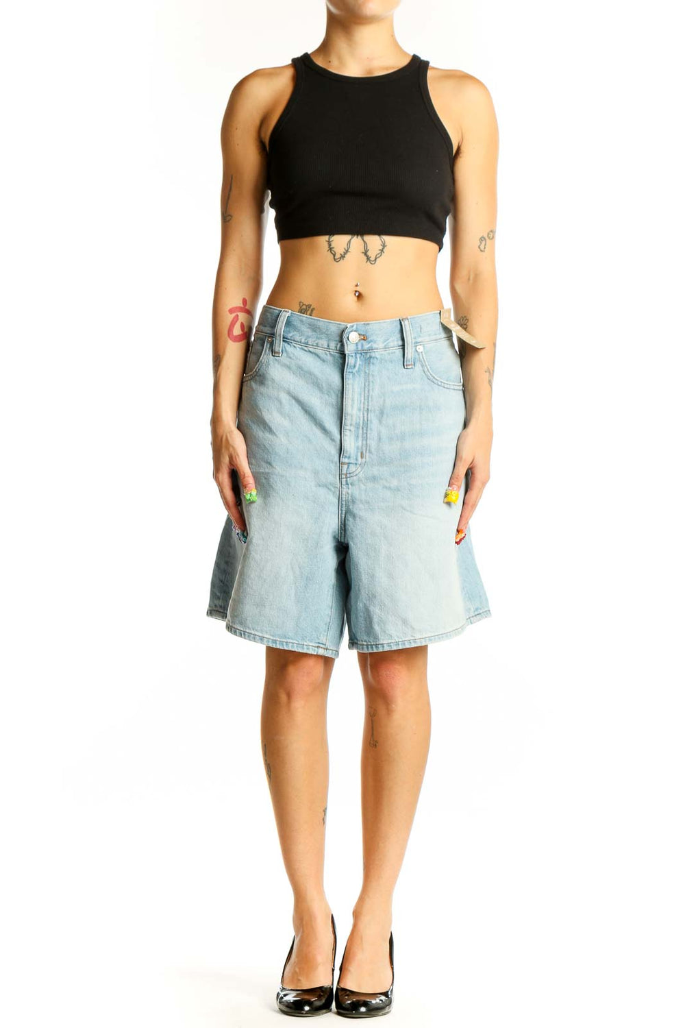 Front view of light blue Madewell denim Bermuda shorts