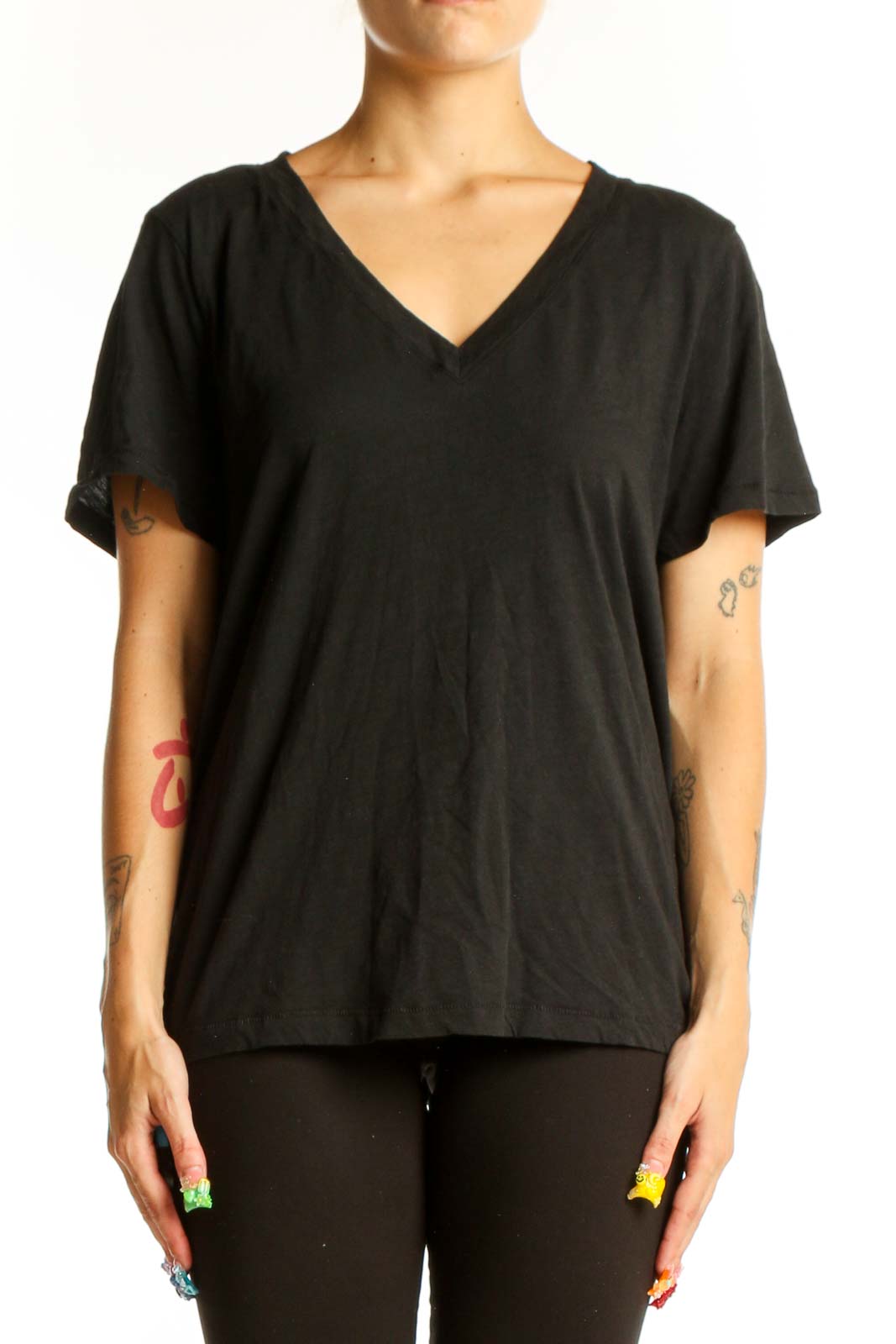 Front view of Madewell black V-neck cotton T-shirt on model