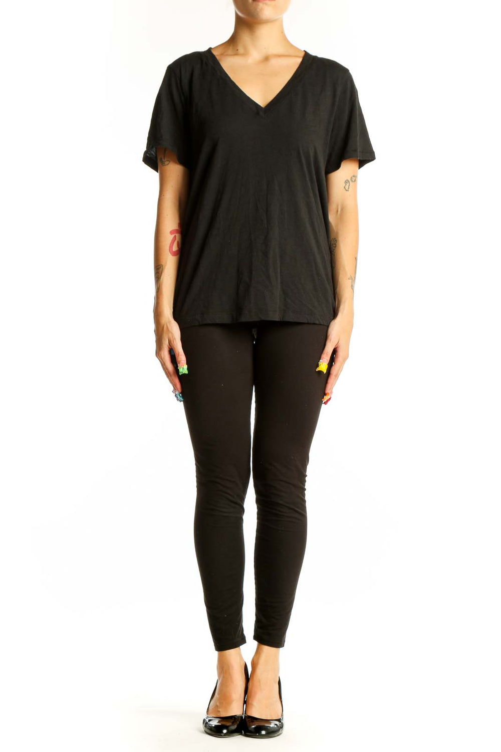 Front view of Madewell black V-neck cotton T-shirt on model