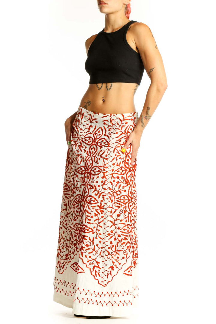 Front view of Soft Surroundings white maxi skirt with red floral print