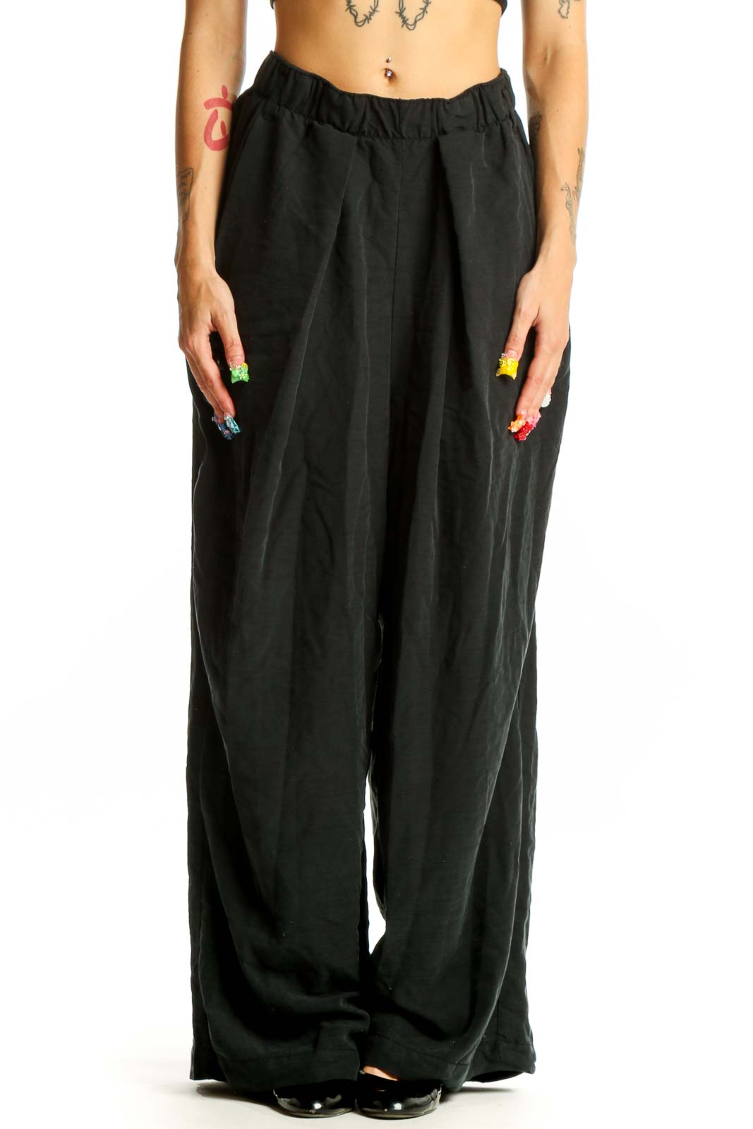 Front view of Free People black wide-leg polyester pants