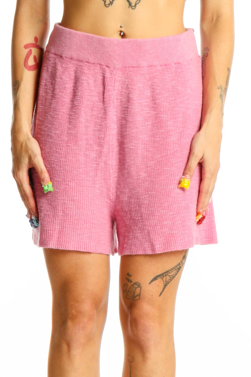 Front view of pink high-waisted ribbed cotton shorts from FP Beach