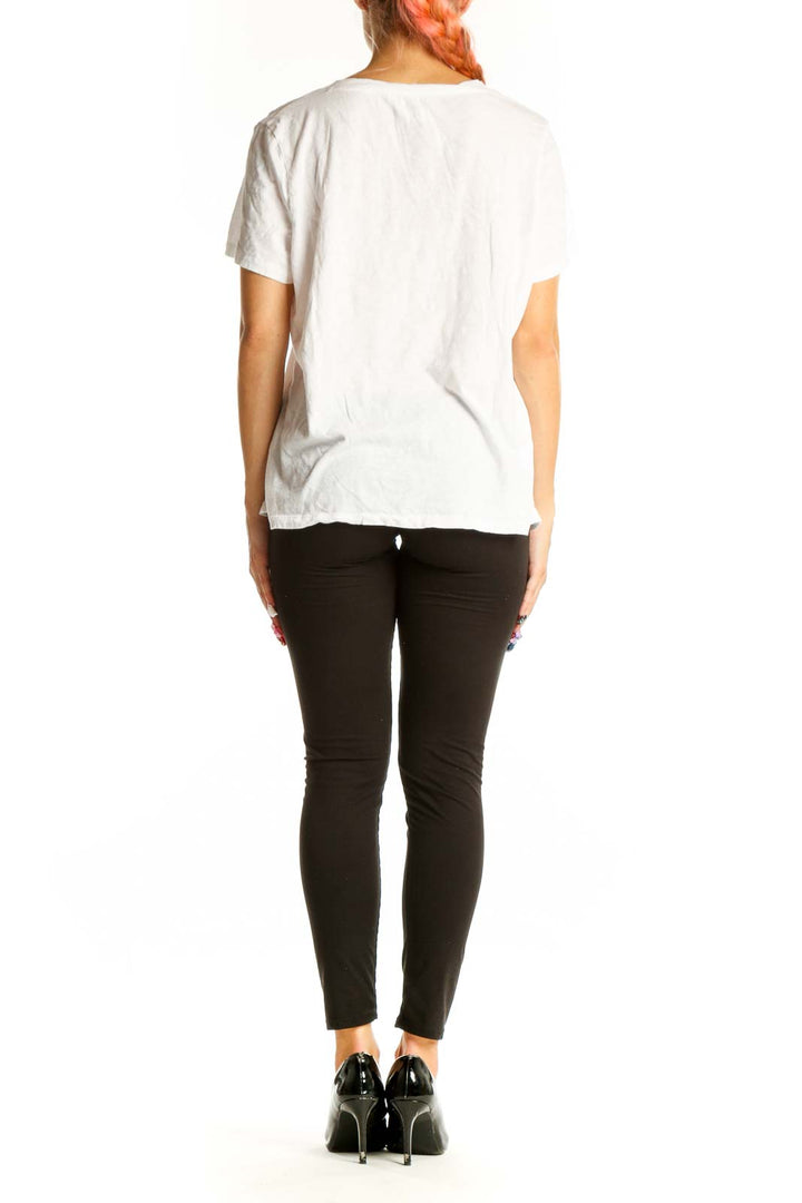 Back view of white Madewell V-neck short sleeve cotton top on model