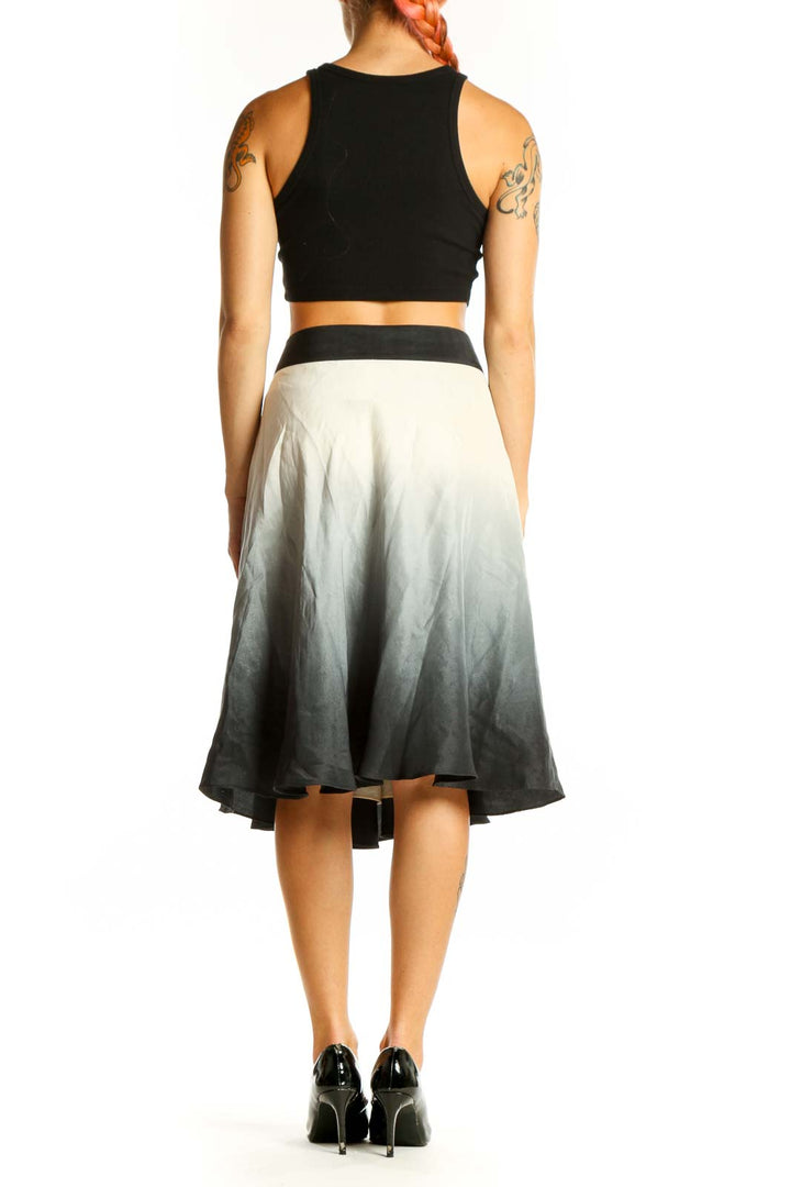 Side view of The Limited ombre gray A-line midi skirt showing gradient and fit