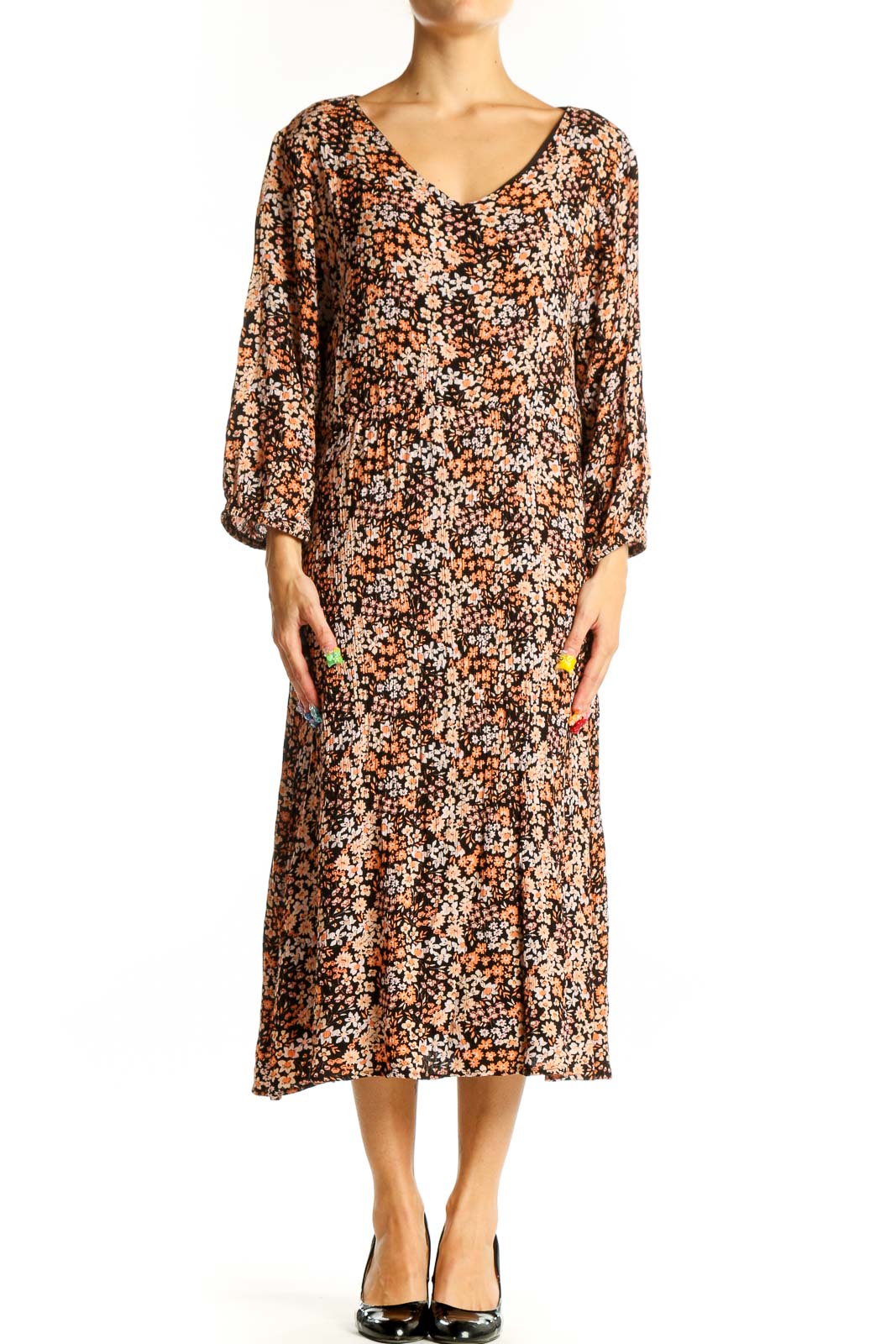 Front view of brown floral midi dress with V-neck and balloon sleeves