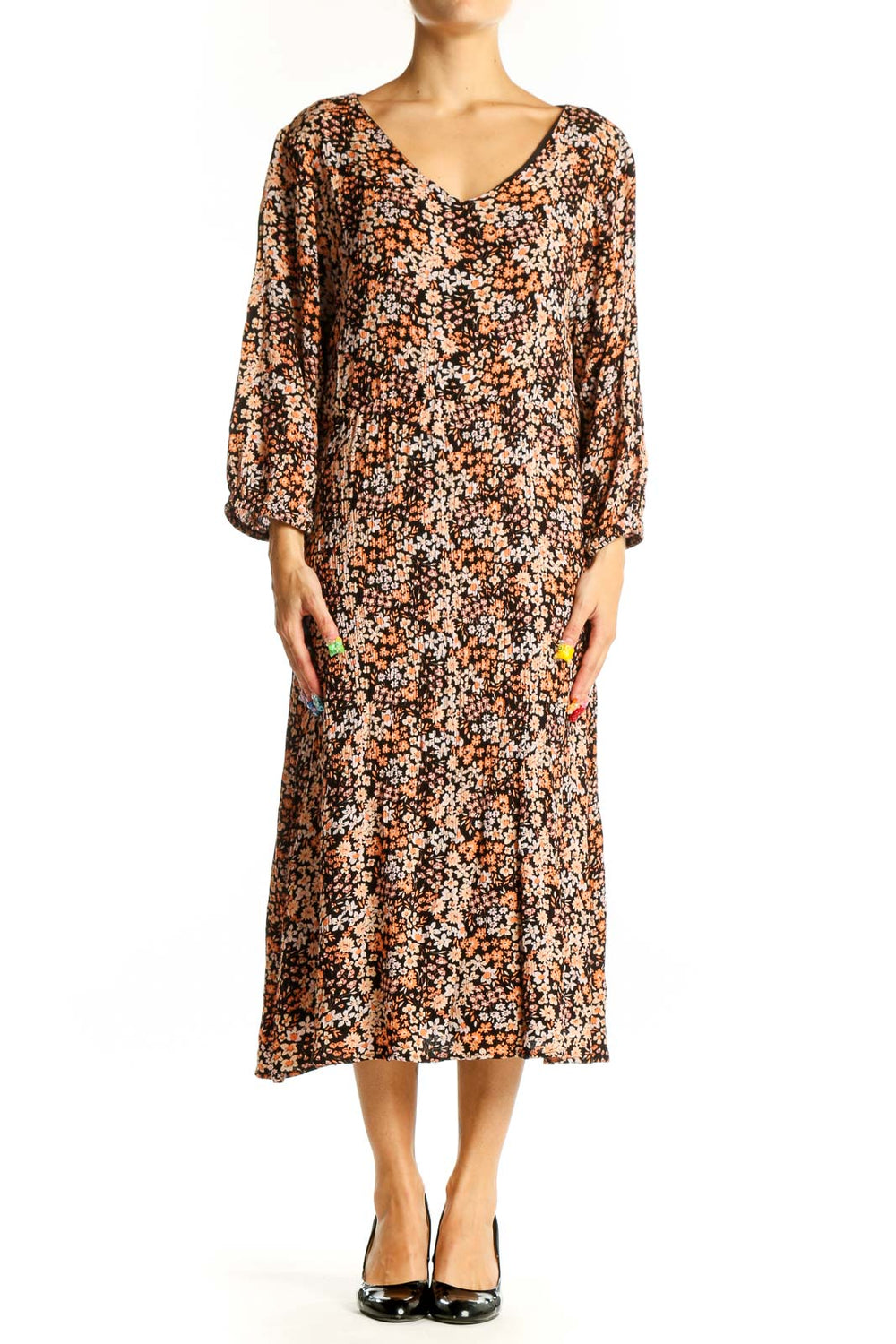 Front view of brown floral midi dress with V-neck and balloon sleeves