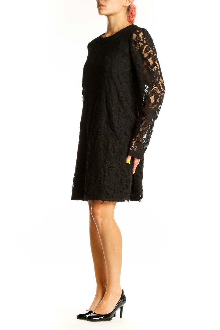 Front view of Michael Stars black lace long sleeve mini dress