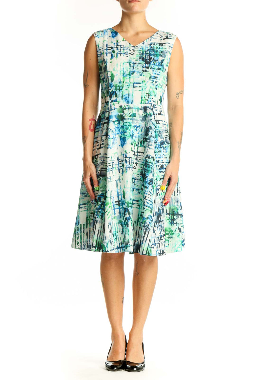 Front view of Shesmiss blue and green abstract print sleeveless dress