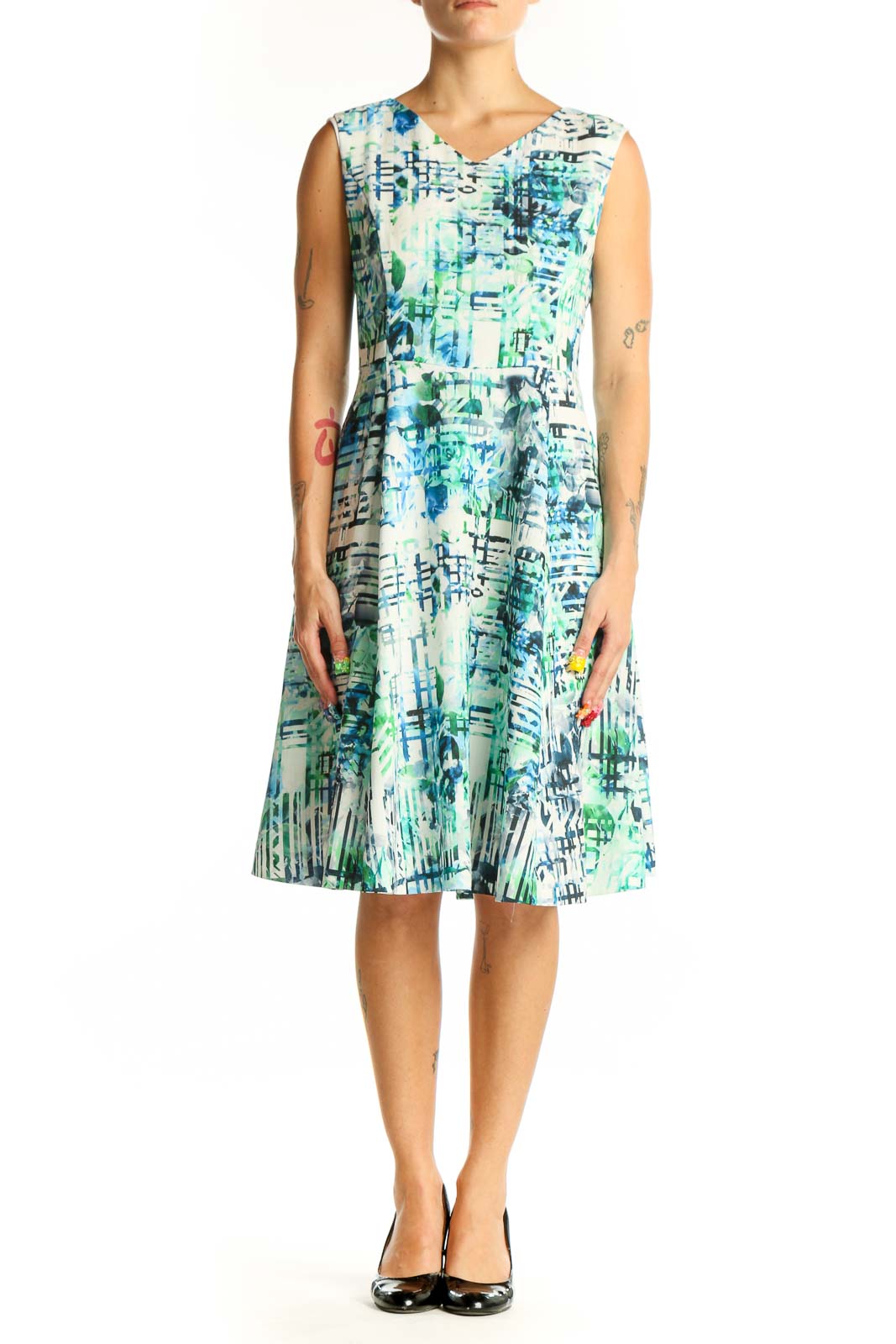 Front view of Shesmiss blue and green abstract print sleeveless dress