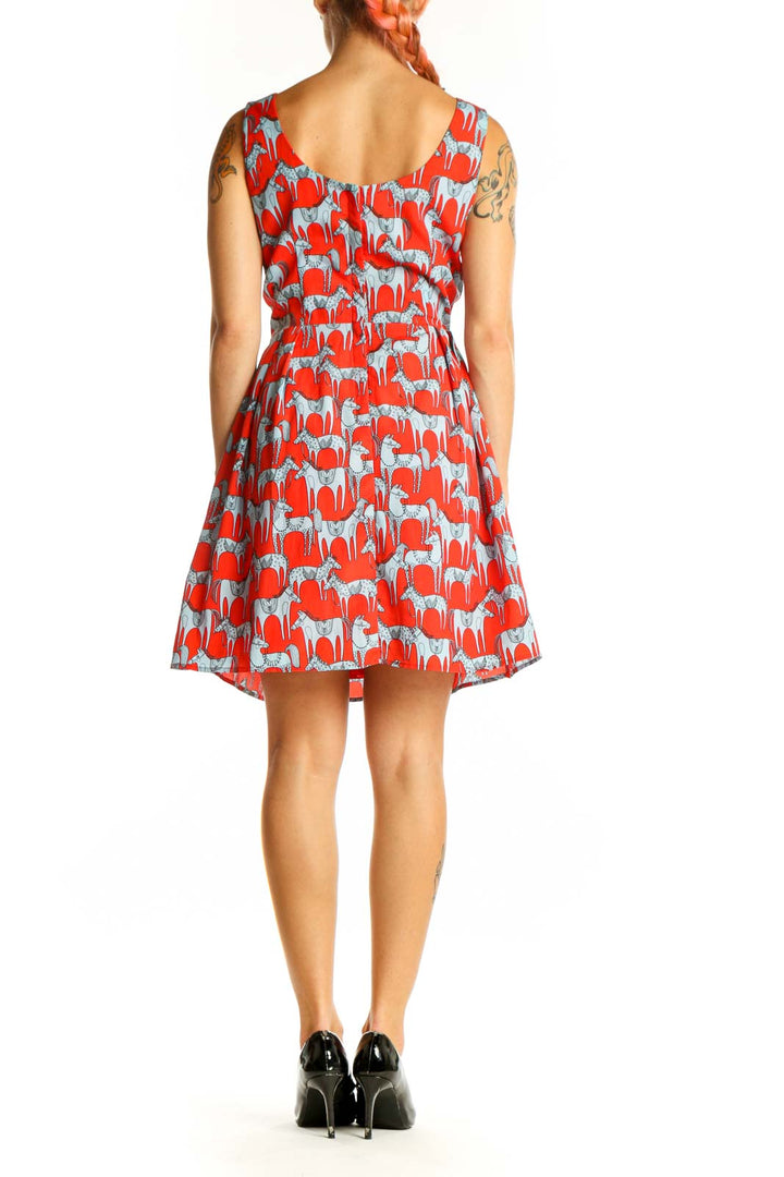 Side view of Red and Blue Horse Print Sleeveless Dress by Pink Owl