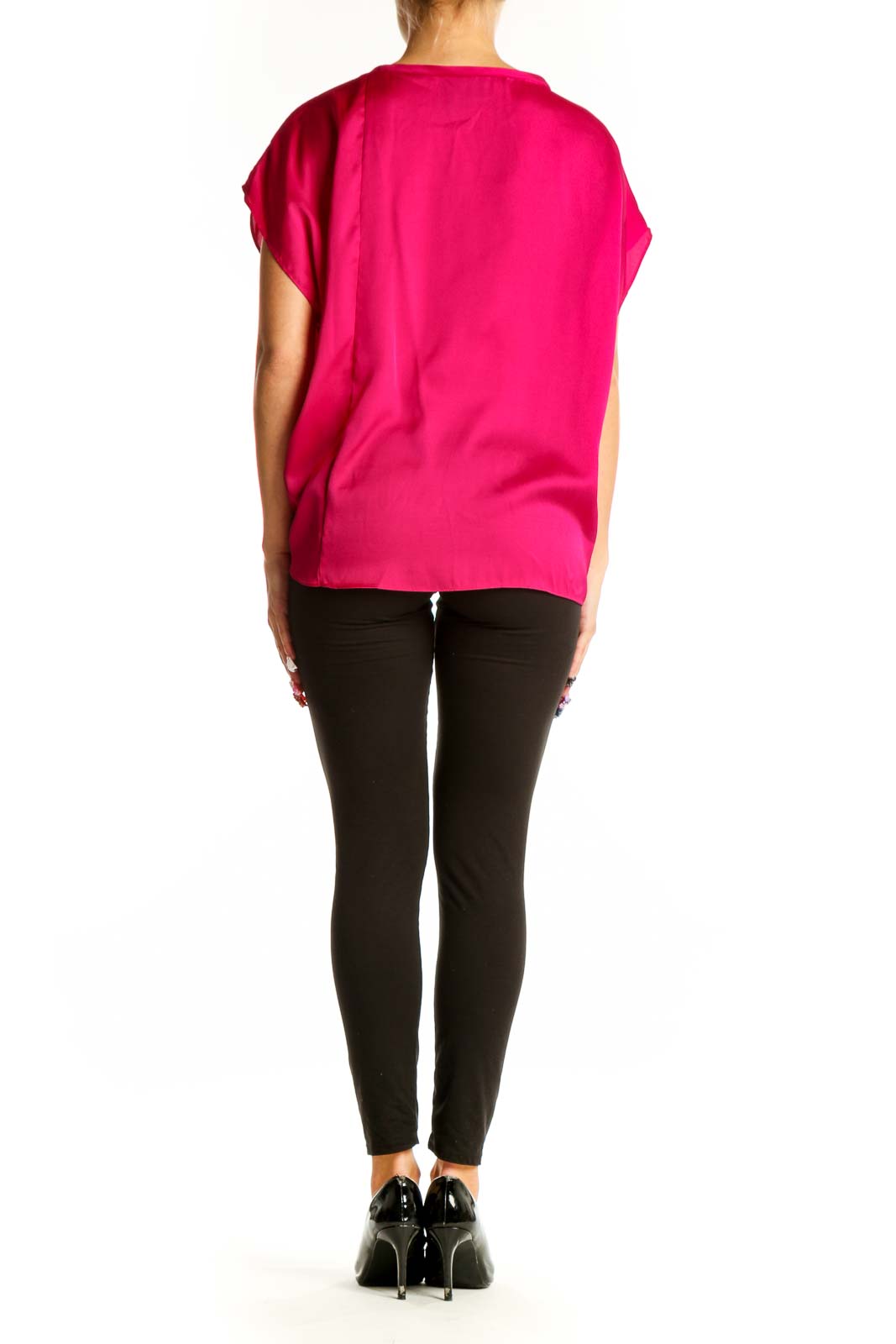 Side view of hot pink DKNY blouse showing dolman sleeves and fit