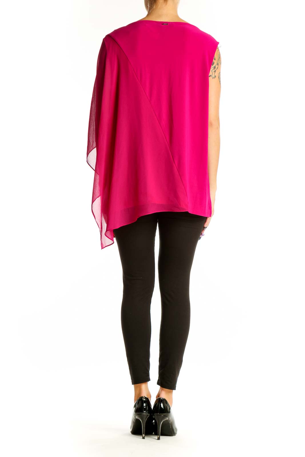 Side view of hot pink asymmetrical DKNY blouse on model