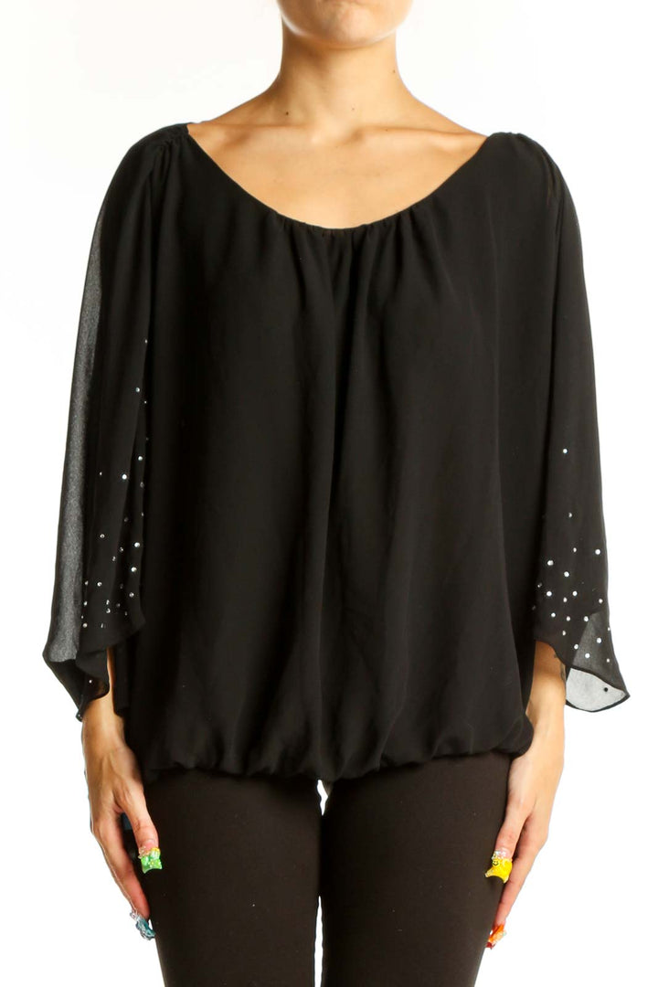 Front view of black SilkRoll blouse with rhinestone-embellished batwing sleeves