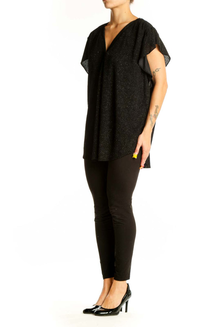 Front view of Vince Camuto black sparkly V-neck top with flutter sleeves