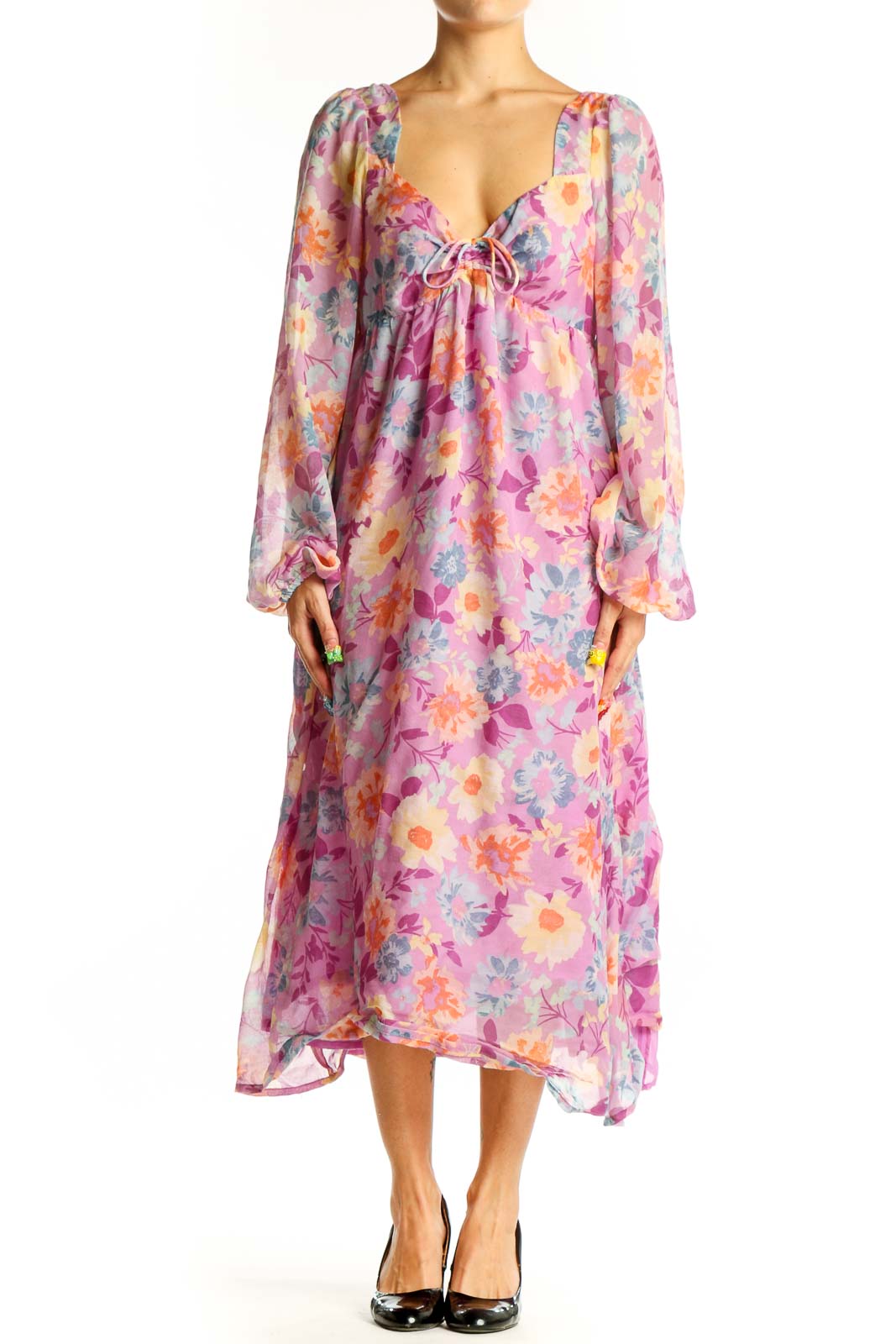 Front view of pink floral Billabong chiffon maxi dress with long sleeves and V-neckline