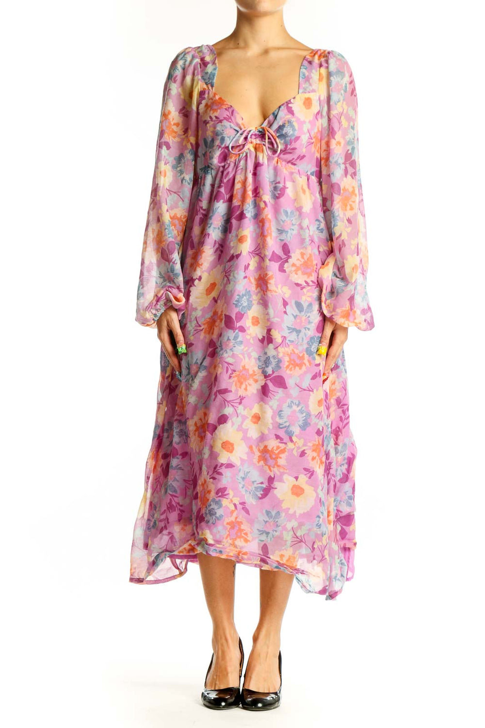 Front view of pink floral Billabong chiffon maxi dress with long sleeves and V-neckline