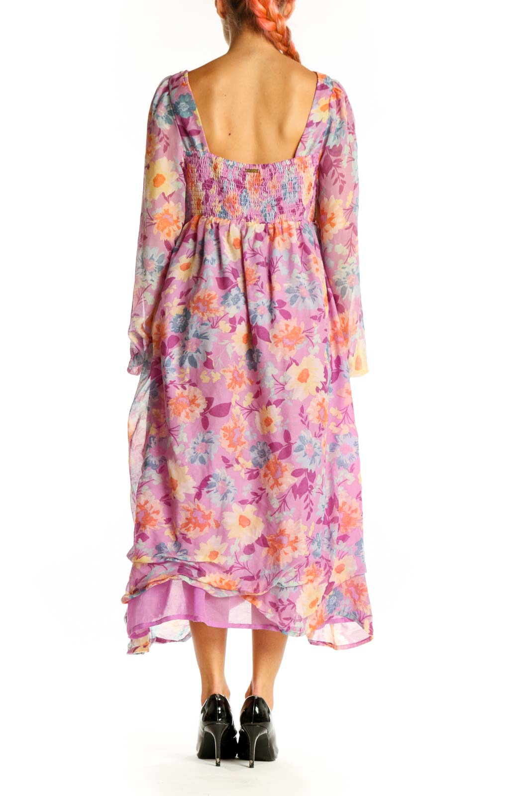 Side view of pink floral Billabong chiffon maxi dress showing flowing silhouette