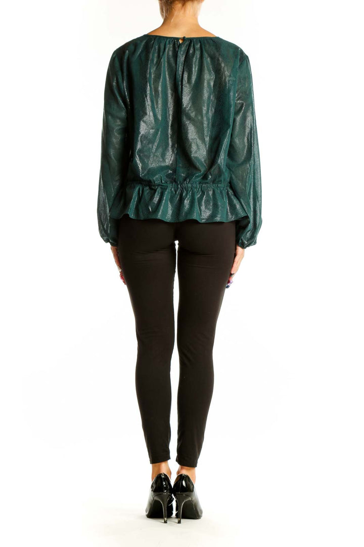 Back view of Rachel Roy forest green shimmery linen blouse showing billowy sleeves