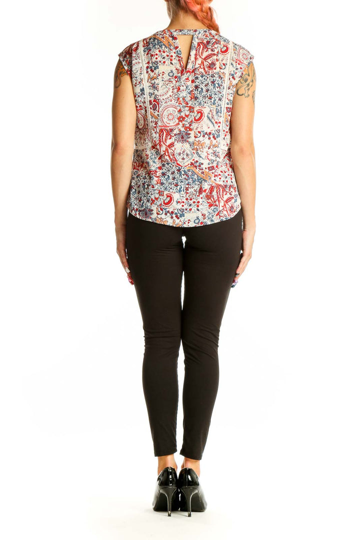 Side view of Daniel Rainn floral print sleeveless top on model