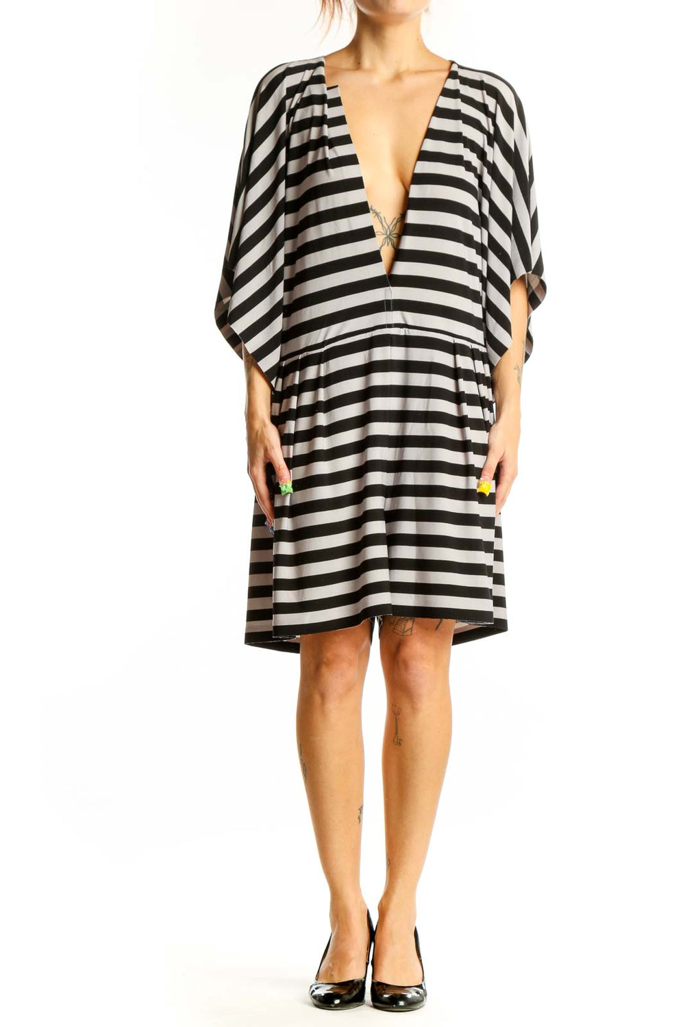 Front view of NORMA KAMALI Black and White Striped Plunge Neck Dress with deep V-neckline