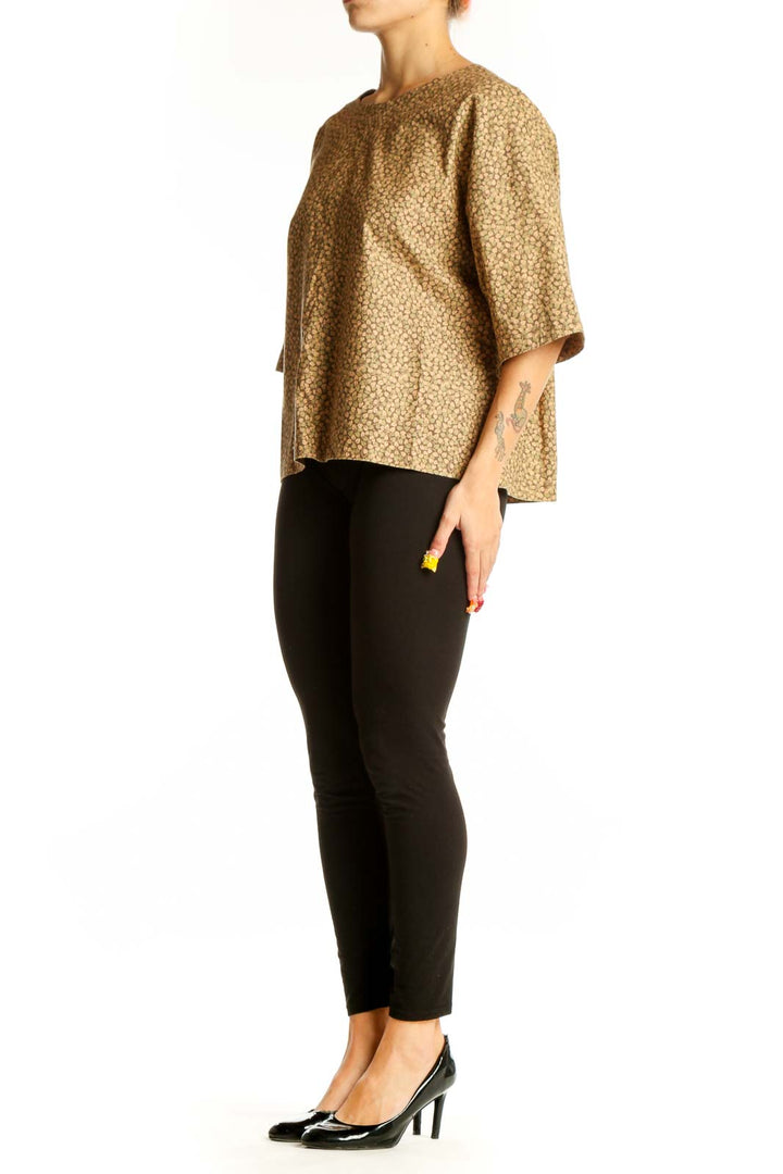 Front view of tan floral print oversized blouse by SilkRoll