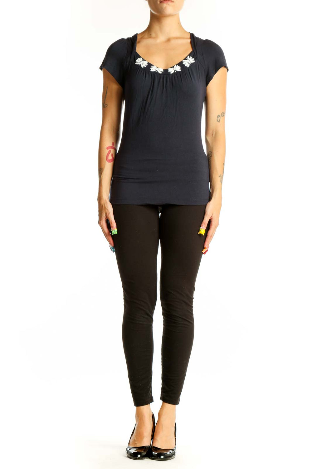 Front view of LOFT black cotton top with embellished neckline
