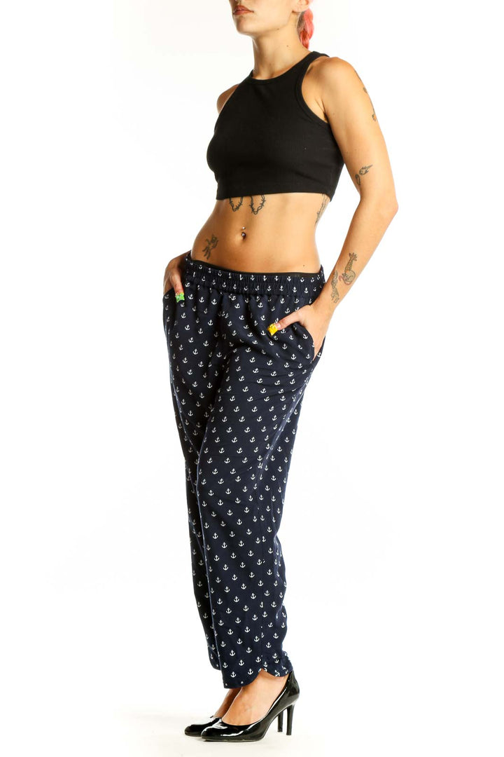 Front view of J.Crew navy pants with white anchor print
