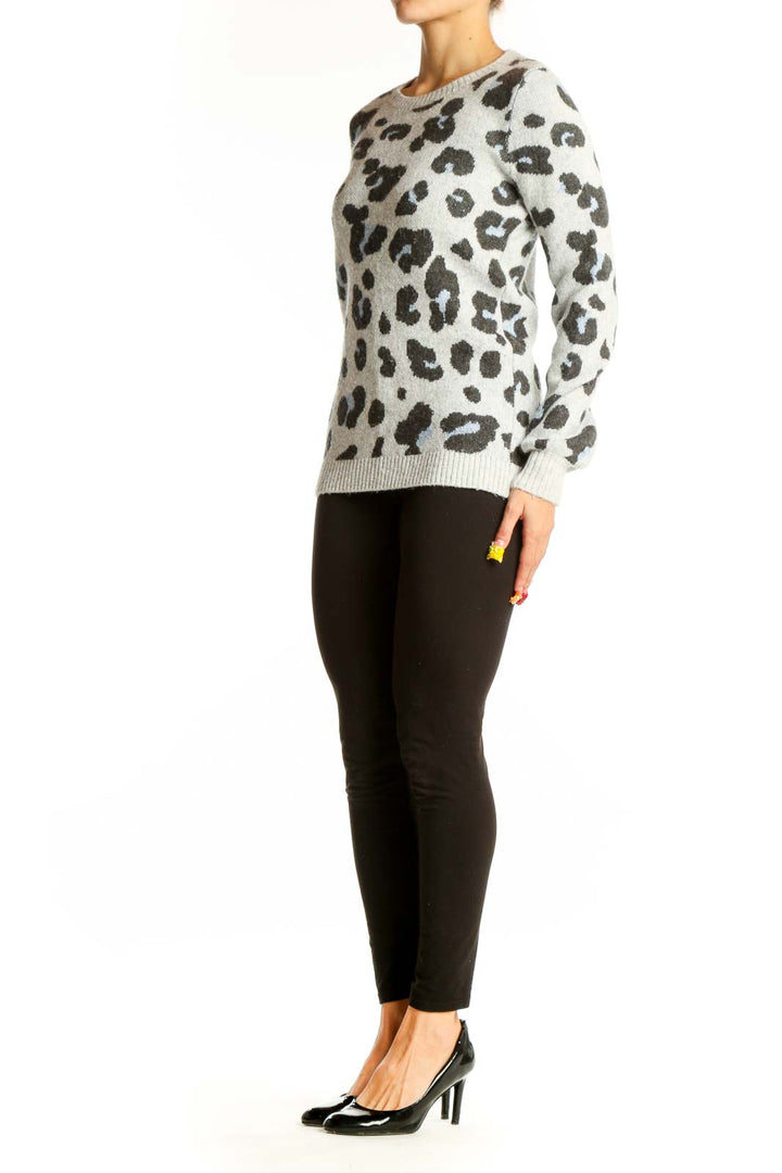 Front view of LOFT gray leopard print knit sweater on model