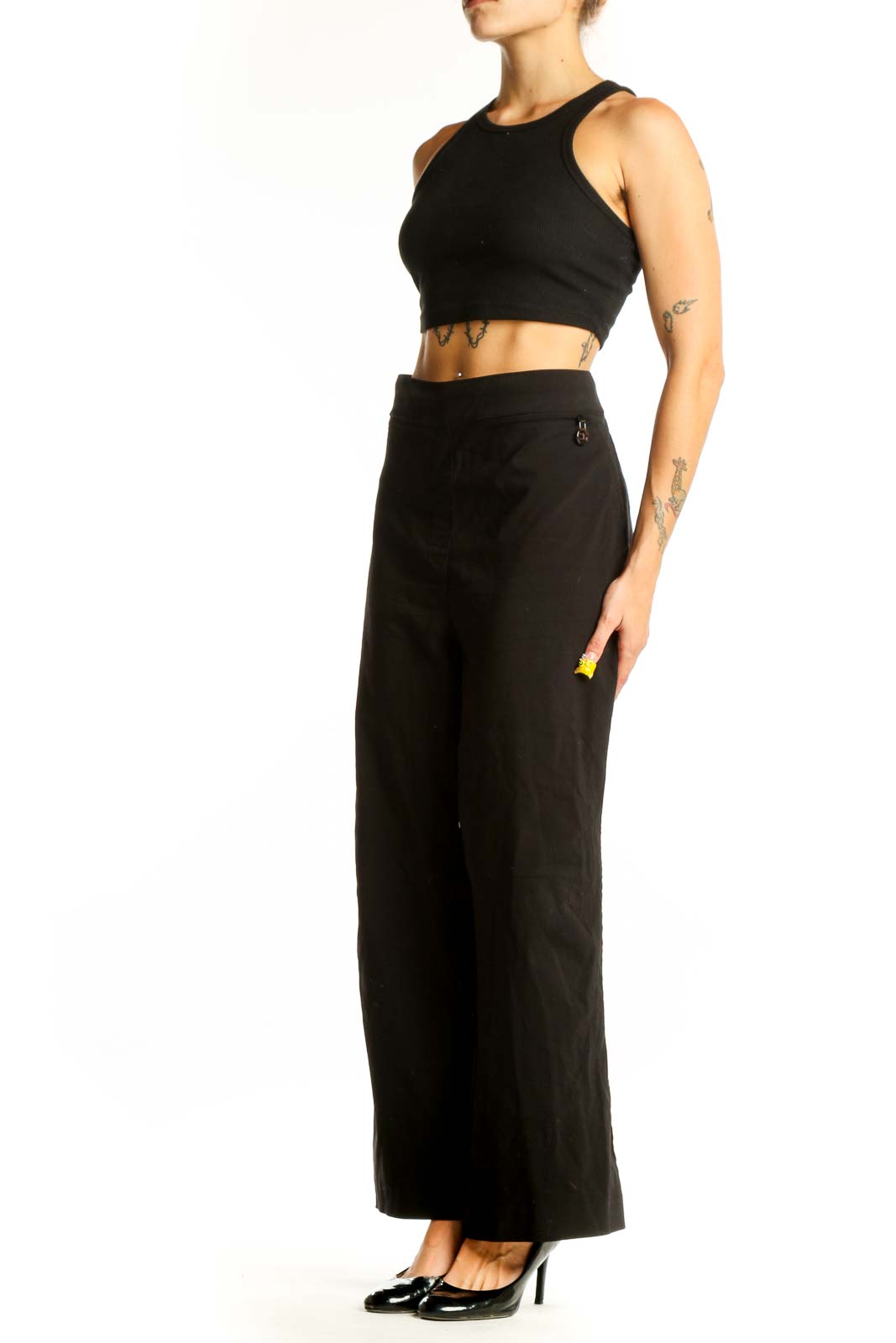 Front view of Calvin Klein black wide-leg trousers on model